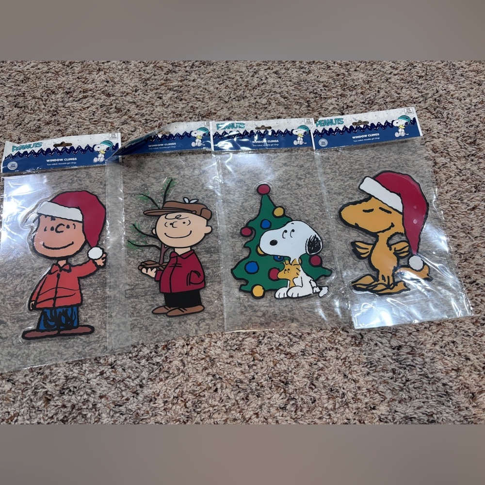 Four Peanuts Christmas Snoopy Gel Window Clings Reusable NIP